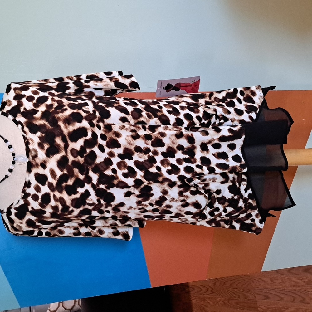 Nina Leonard top,size Med.